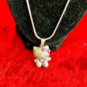 Hello Kitty style charm. 925 silver. 925 silver snake chain. Number one.